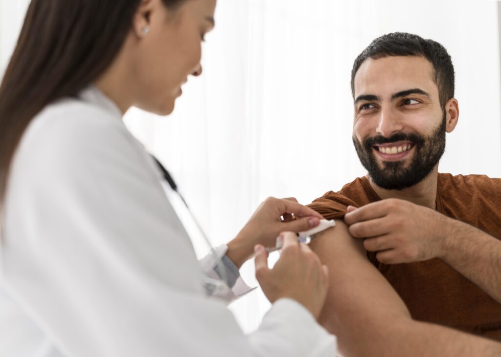 male patient getting TB skin test from female doctor